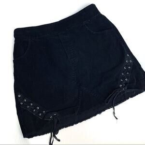 Don’t ask why corduroy skirt  with a lace up detail elastic waist ***flaw